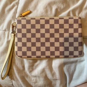 Daisy Rose White Checkered wristlet.